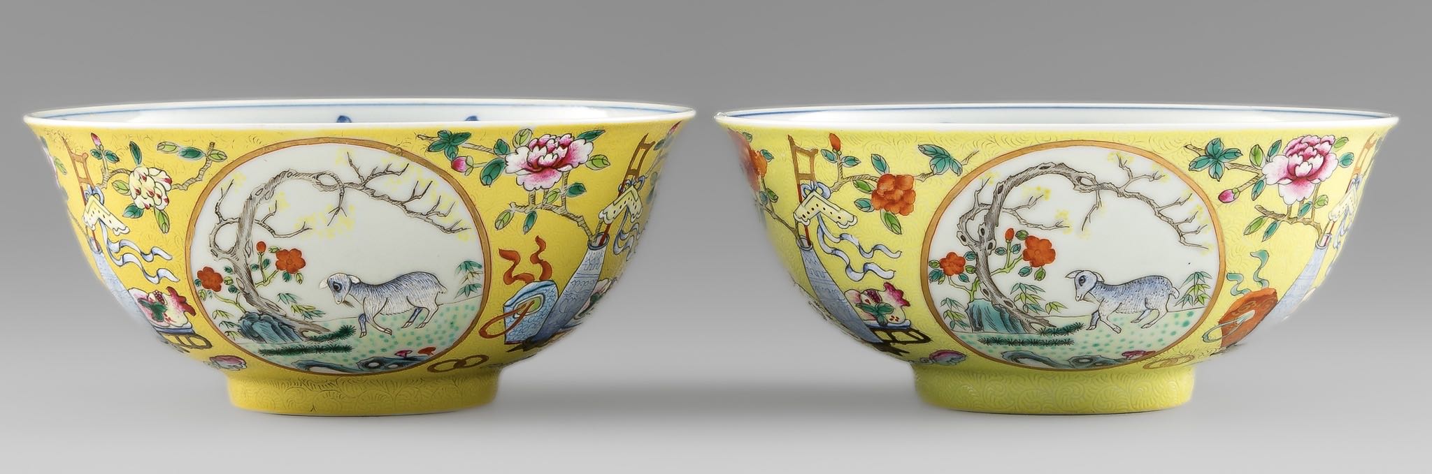 黄地轨道粉彩开光三羊开泰碗